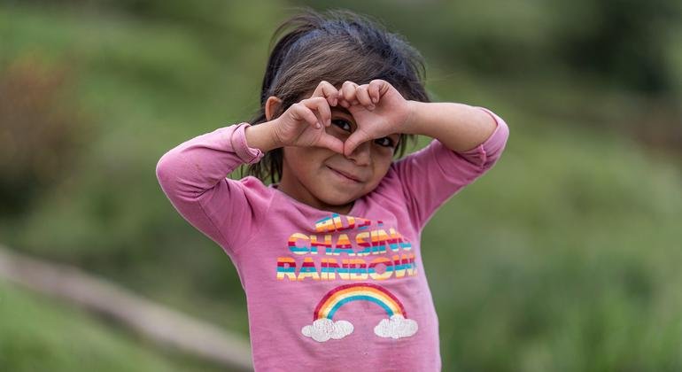 A five-year-old girl makes a heart with her hands in the rural community of Chajul, in Quiche Guatemala. A five-year-old girl makes a heart with her hands in the rural community of Chajul, in Quiche Guatemala.