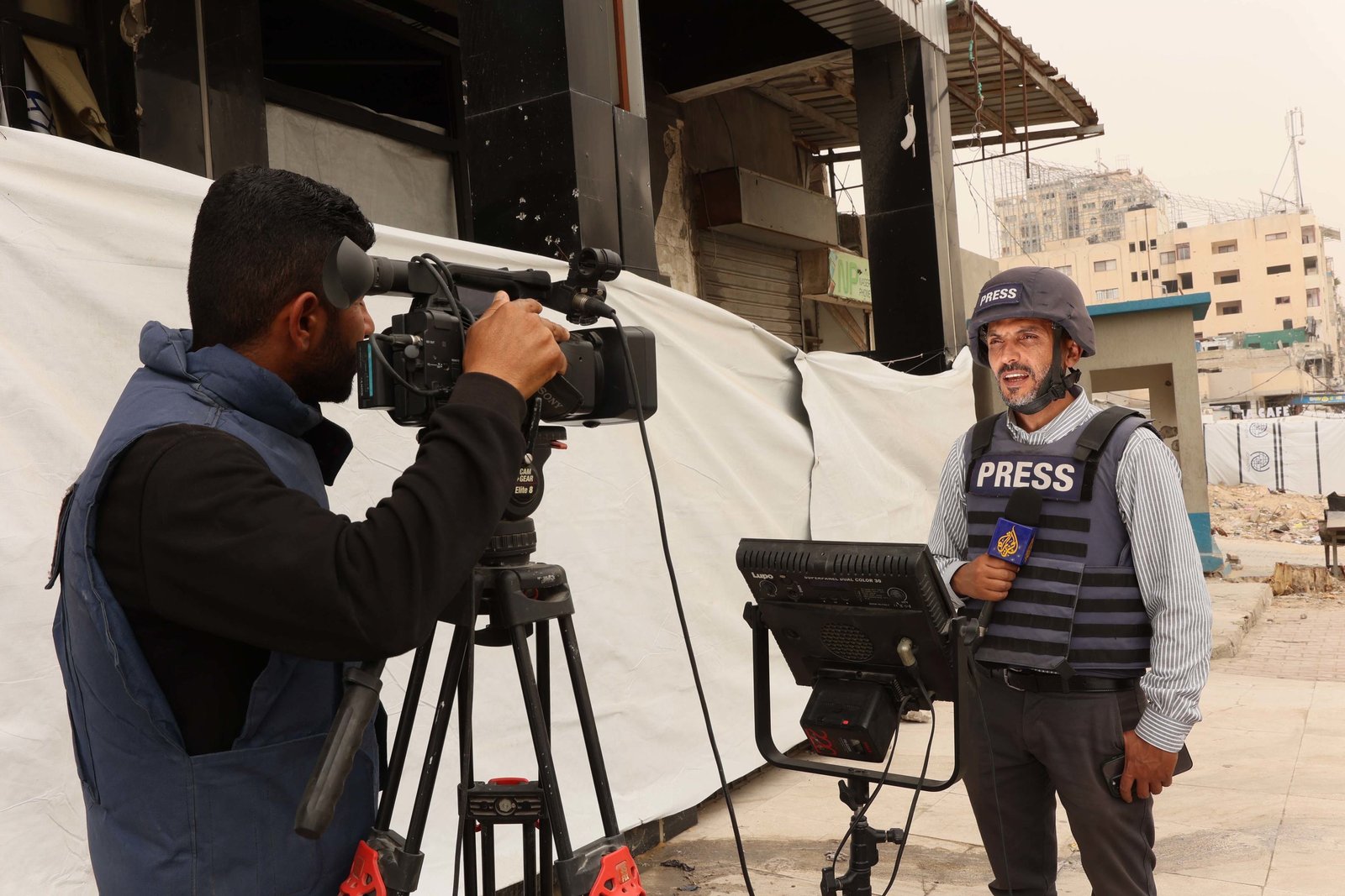 Palestinian journalist, Moamen Sharafi (right,) lost several family members during the current war that started in October 2023. Palestinian journalist, Moamen Sharafi (right,) lost several family members during the current war that started in October 2023.